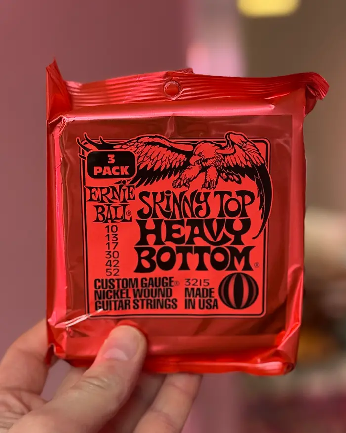 Ernie Ball Ernie Ball Skinny Top Heavy Bottom 3-pack, 10-52, 3 комплекта струн для электрогитары