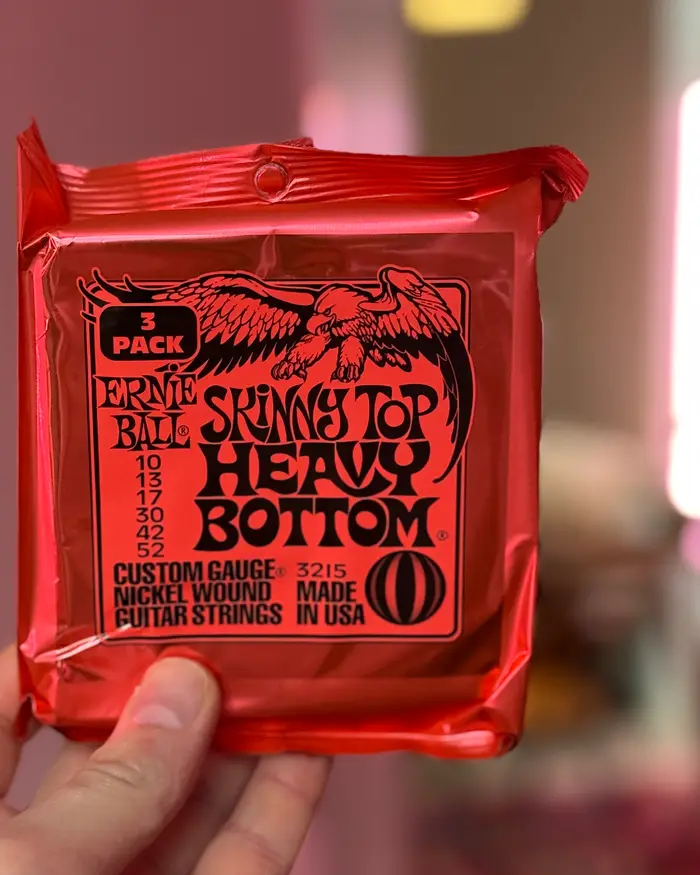 Ernie Ball Ernie Ball Skinny Top Heavy Bottom 3-pack, 10-52, 3 комплекта струн для электрогитары